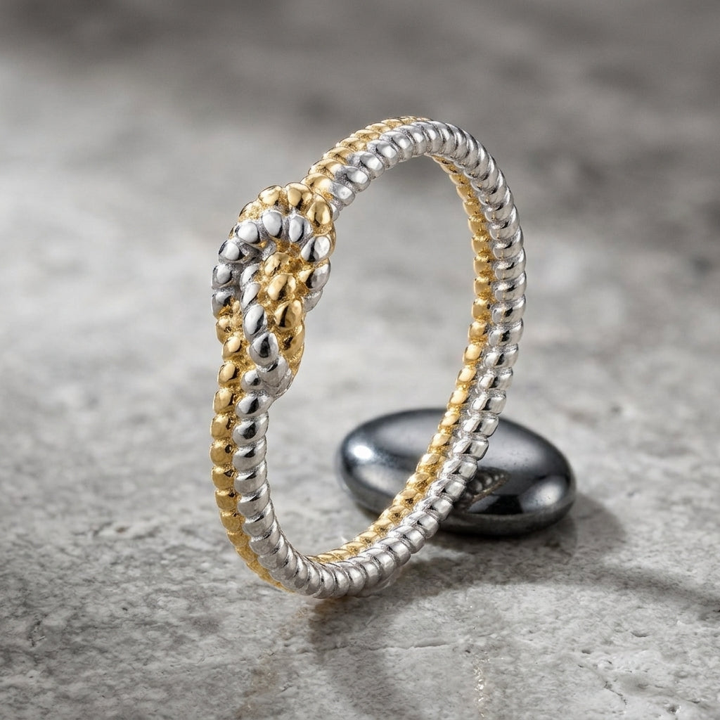 Eternal Bond Knot Ring with intertwined silver and gold strands