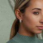 Handmade silver earrings featuring premium CZ stones