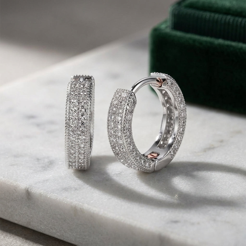 Lightweight silver hoop earrings with secure hinged closure