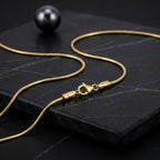 Lightweight waterproof gold necklace with flat snake links